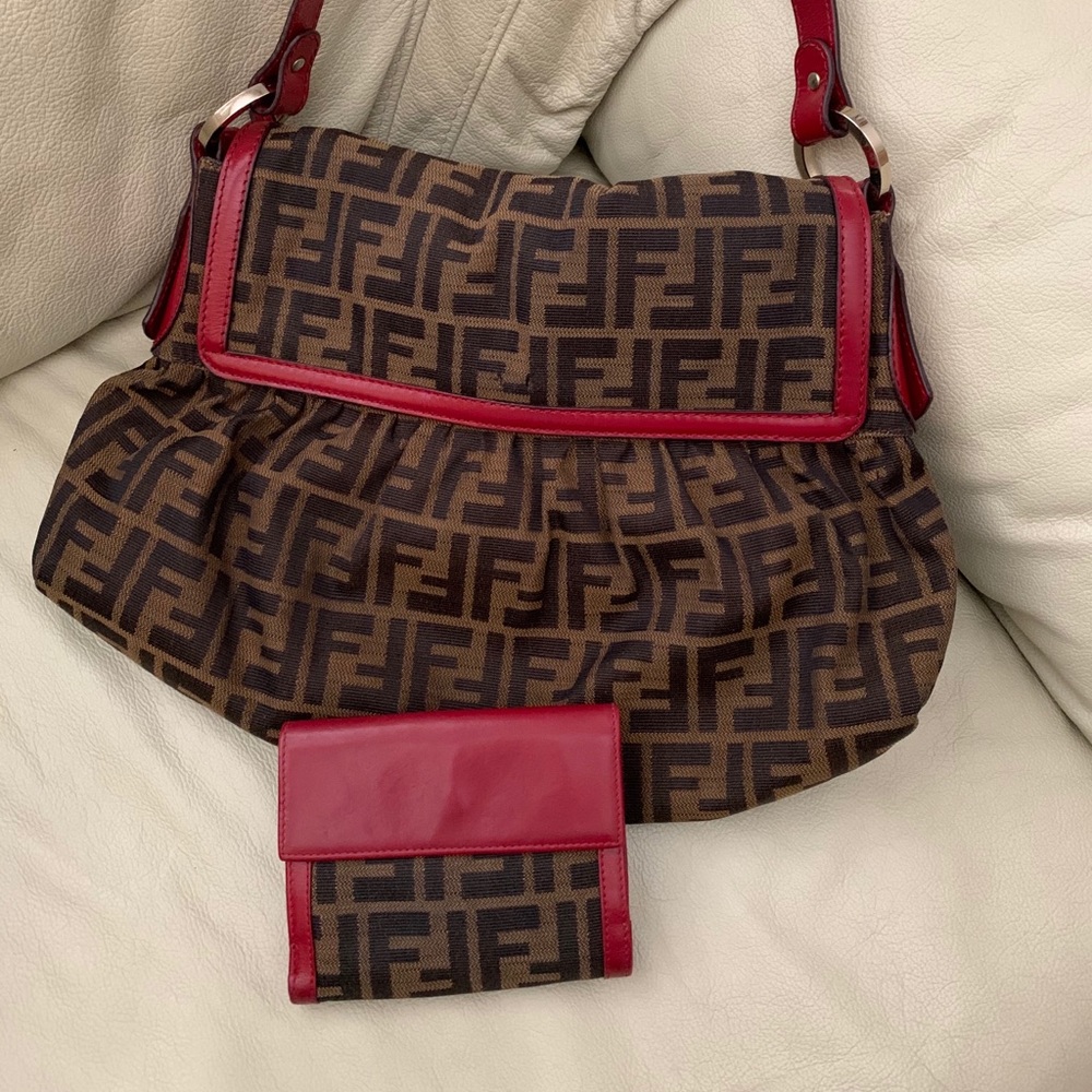 Authentic Fendi Purse with a marching wallet.